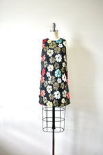 Black Sleeveless Mini Dress with Floral Pattern and Cutout Back