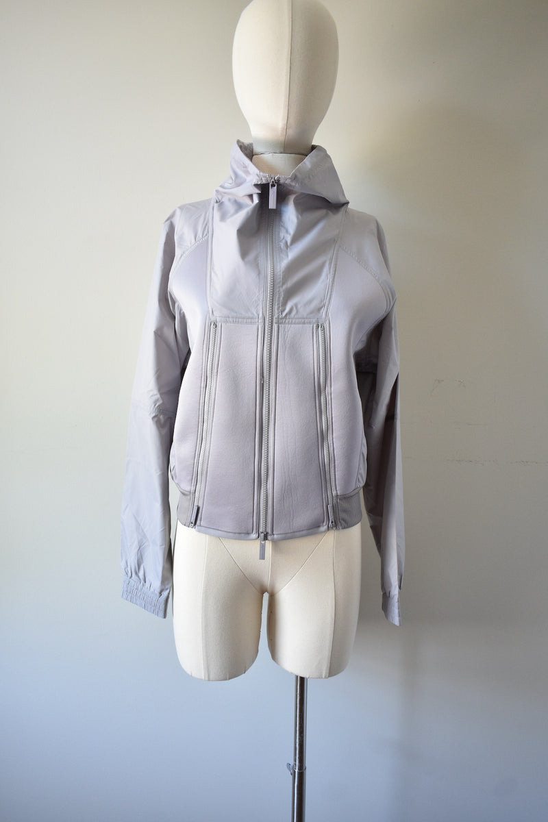 Gray Windbreaker Jacket From The Collaboration of Adidas and Stella Mc Cartney