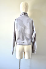 Gray Windbreaker Jacket From The Collaboration of Adidas and Stella Mc Cartney