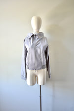 Gray Windbreaker Jacket From The Collaboration of Adidas and Stella Mc Cartney