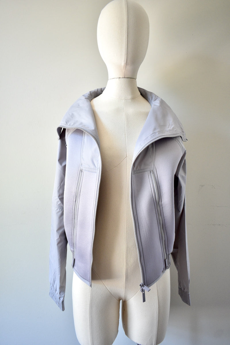 Gray Windbreaker Jacket From The Collaboration of Adidas and Stella Mc Cartney
