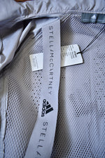 Gray Windbreaker Jacket From The Collaboration of Adidas and Stella Mc Cartney