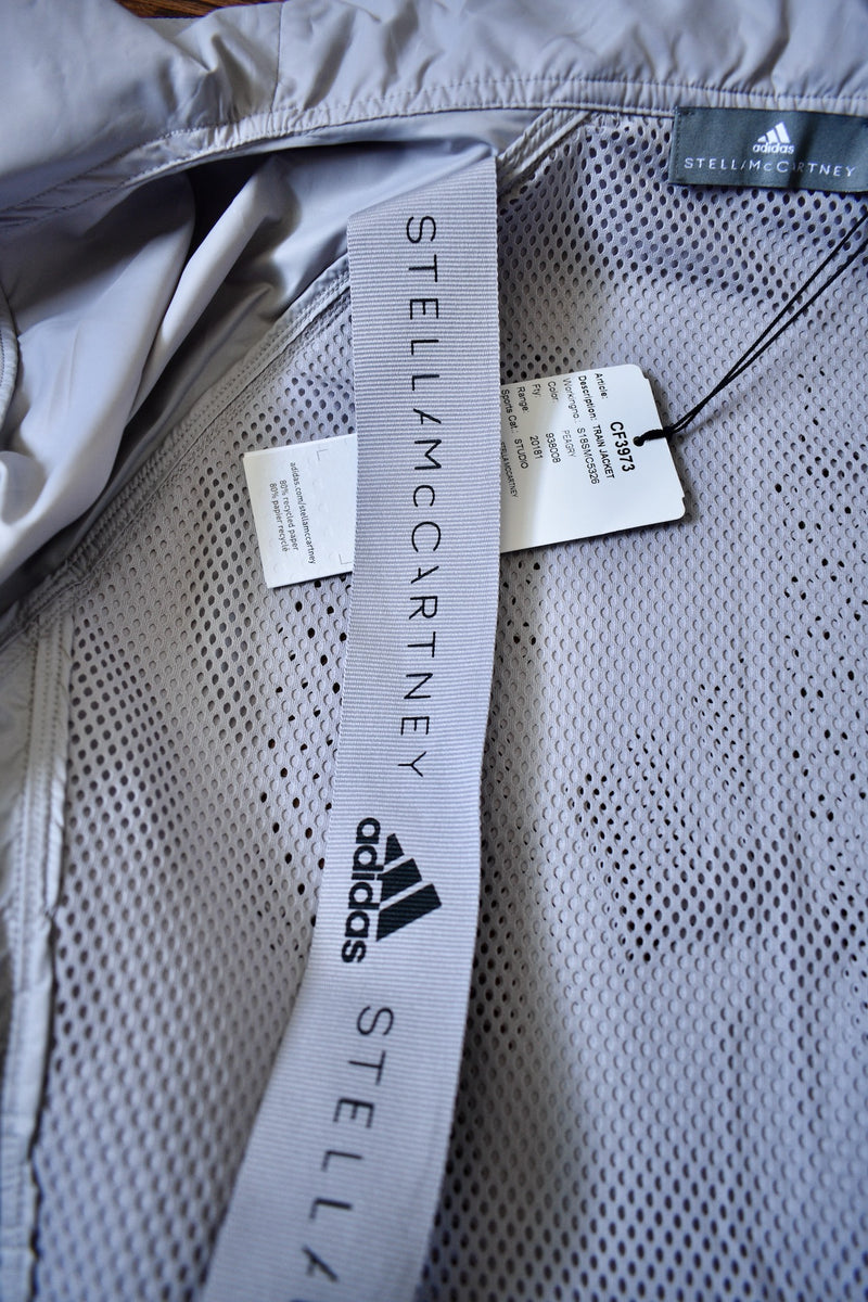 Gray Windbreaker Jacket From The Collaboration of Adidas and Stella Mc Cartney